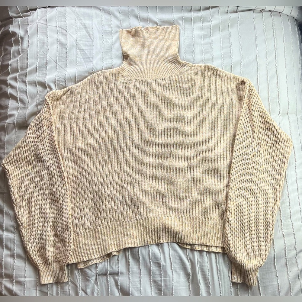 Urban Outfitters Cream knit turtleneck sweater. Slit in the side. 60% cotton.